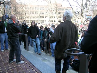 Matthew Abel speaks to the crowd at Hash Bash
